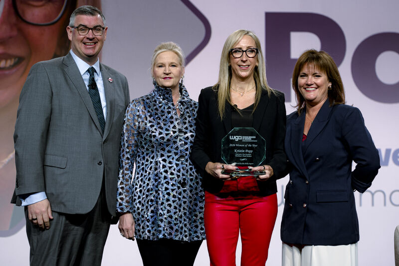 Kristin Popp accepting the 2026 Woman of the Year award from the NGA.